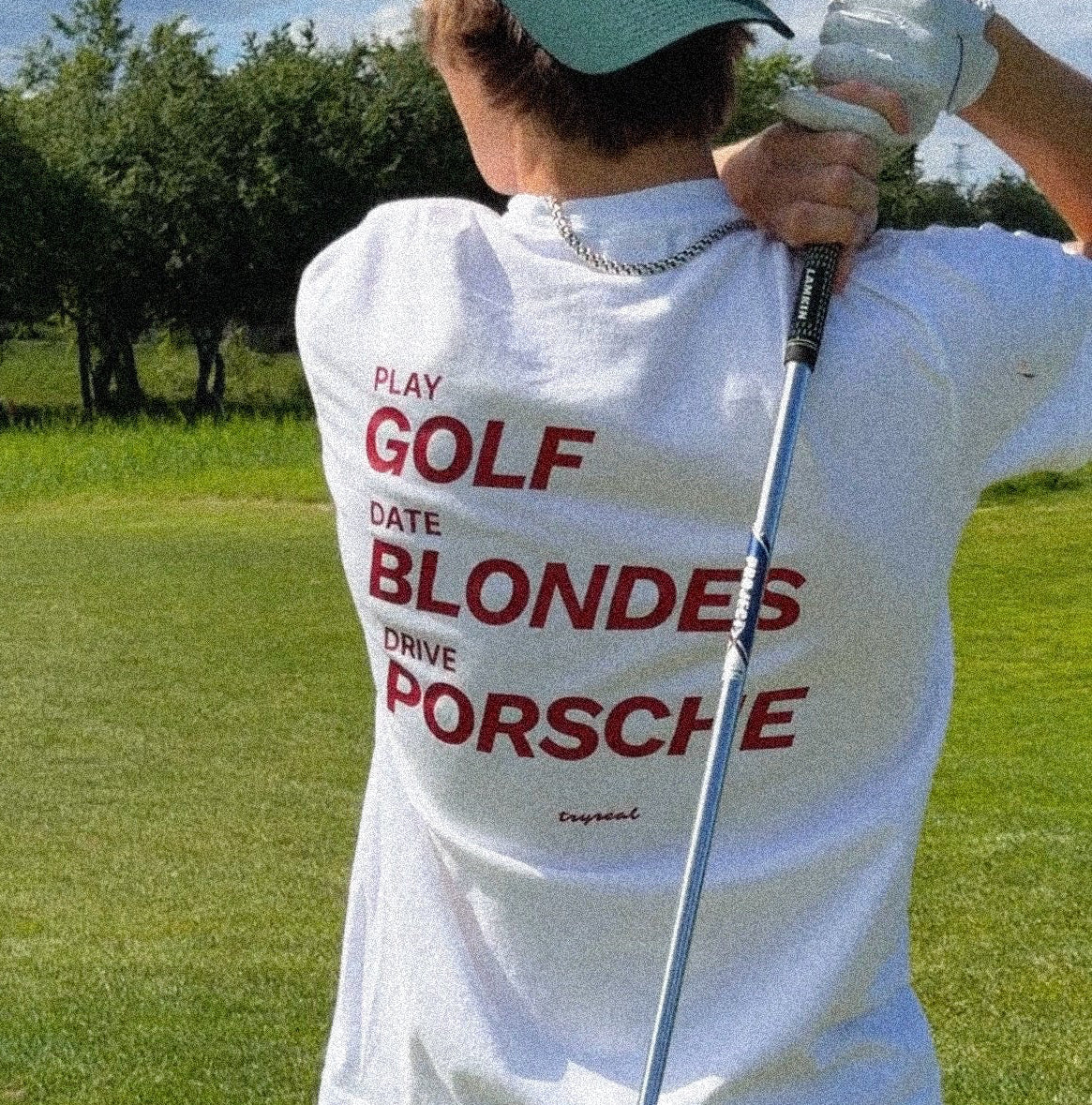 PLAY GOLF, DATE BLONDES, DRIVE PORSCHE